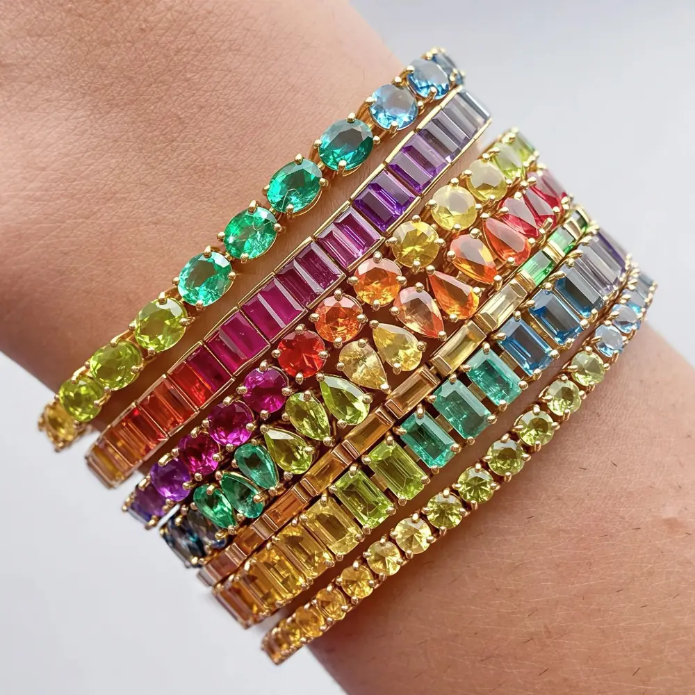 a hand showing multi color gemstones and different variations